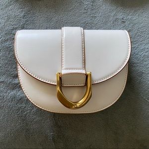 Charles & Keith Mini Gabine Saddle Bag Light Pink